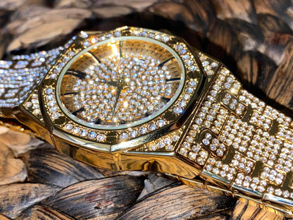 Gold iced-out octagon watch with pavé dial, classic markers, and diamond bracelet – luxury streetwear timepiece