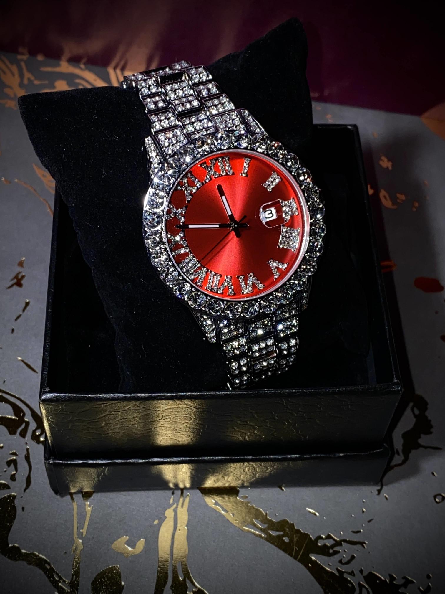 Red dial Roman numeral iced-out watch with crystal bezel and silver pavé band – luxury statement accessory