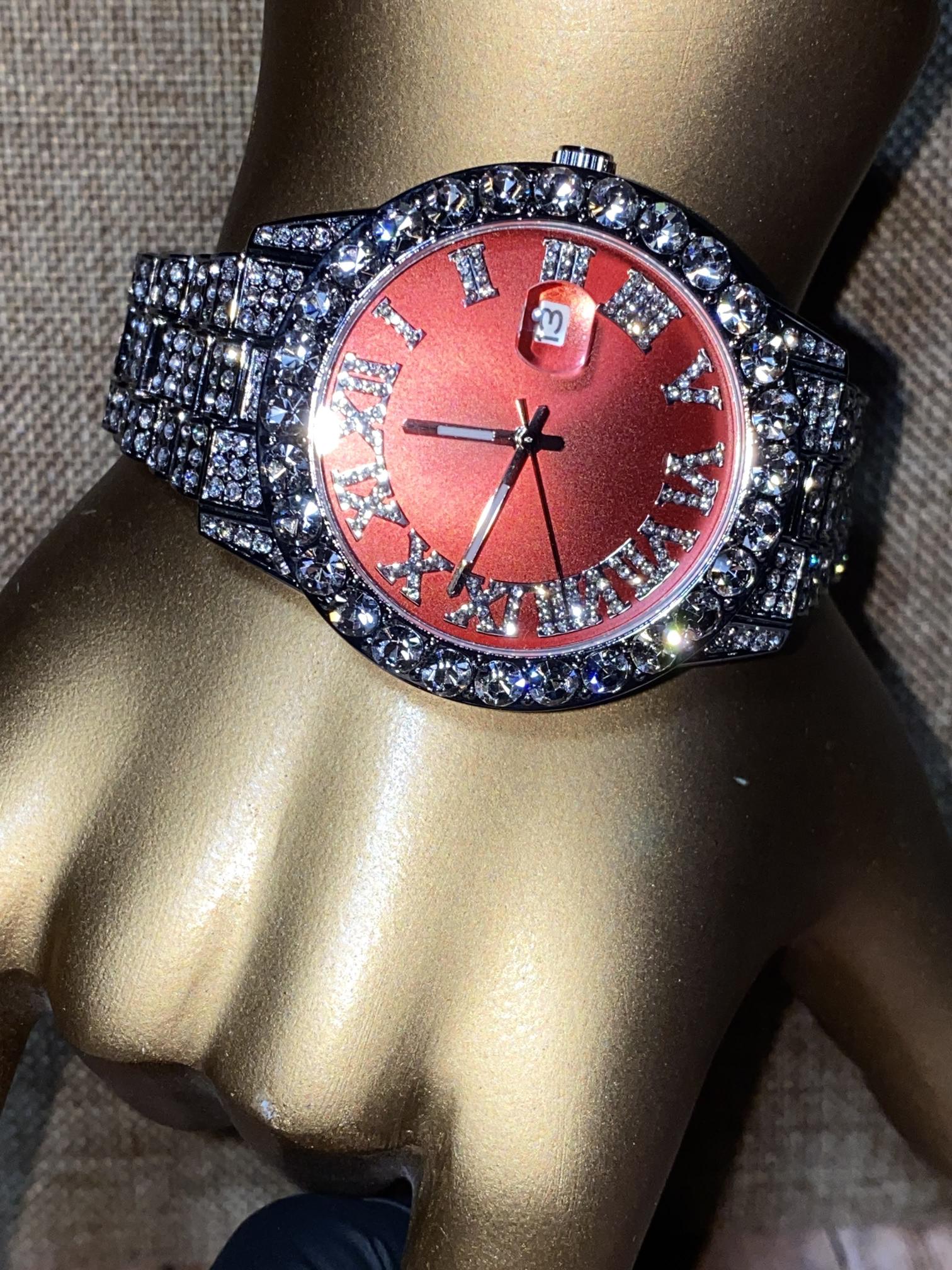Red dial Roman numeral iced-out watch with crystal bezel and silver pavé band – luxury statement accessory