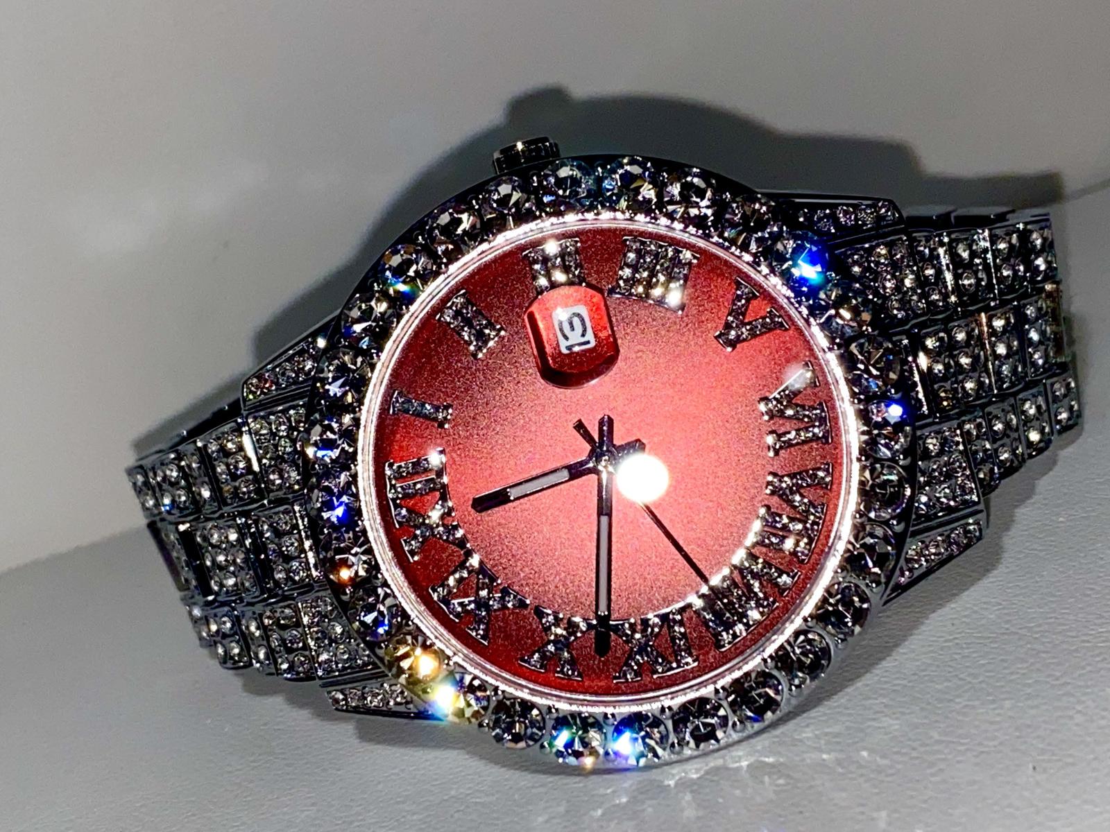 Red dial Roman numeral iced-out watch with crystal bezel and silver pavé band – luxury statement accessory