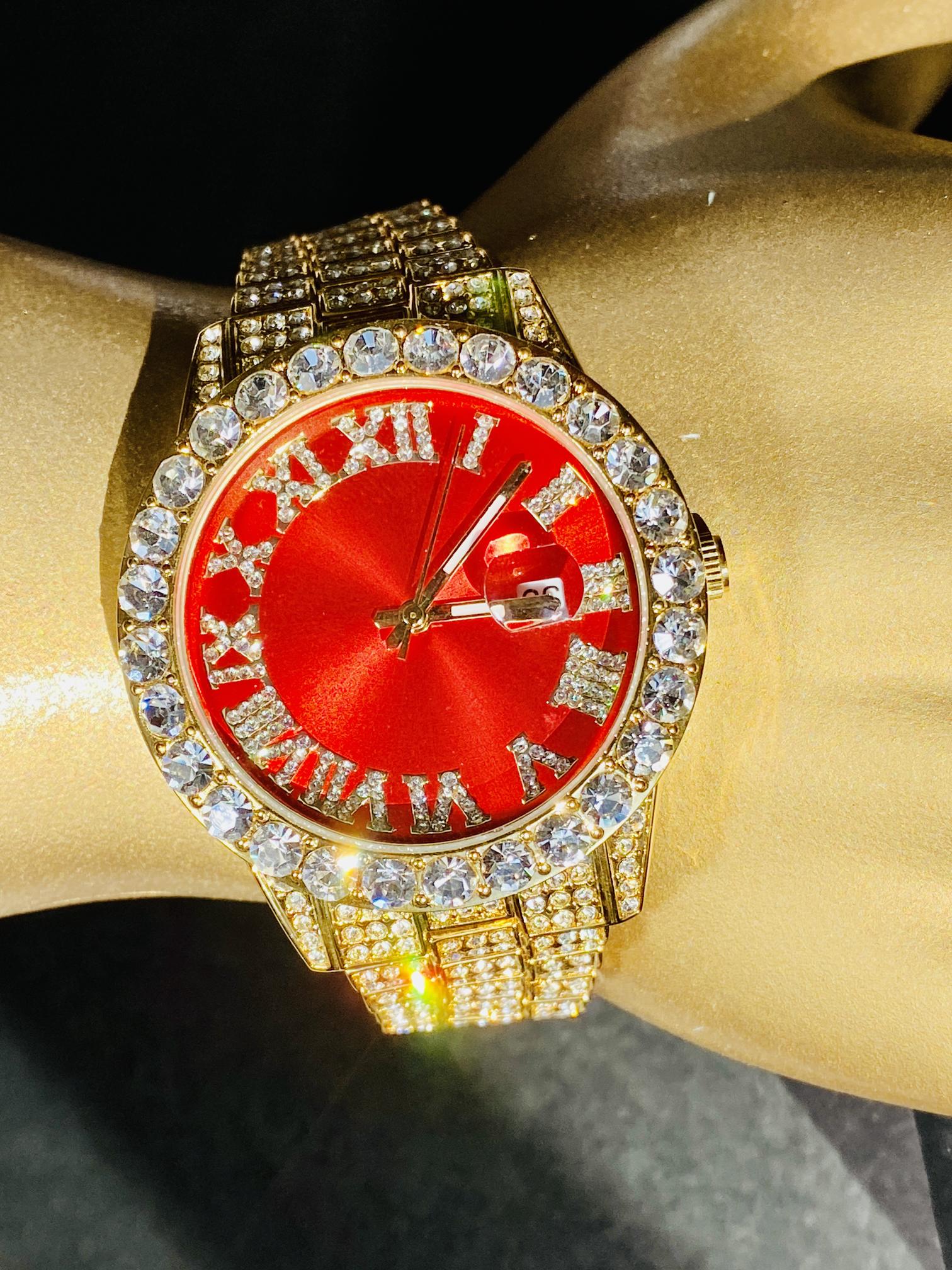 Gold iced-out watch with scarlet red dial, Roman numerals, and diamond bracelet – luxury streetwear timepiece