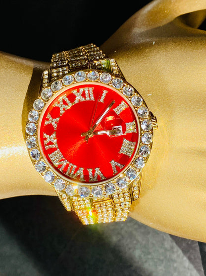 Gold iced-out watch with scarlet red dial, Roman numerals, and diamond bracelet – luxury streetwear timepiece