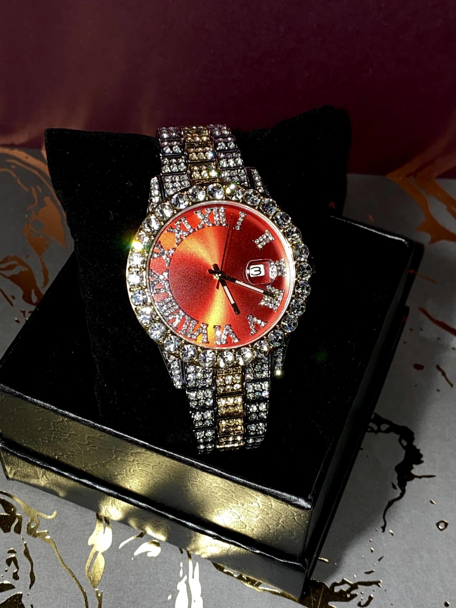Two-tone iced-out watch with red dial, Roman numerals, and diamond bracelet – luxury streetwear timepiece