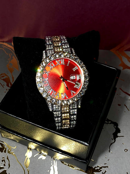 Two-tone iced-out watch with red dial, Roman numerals, and diamond bracelet – luxury streetwear timepiece