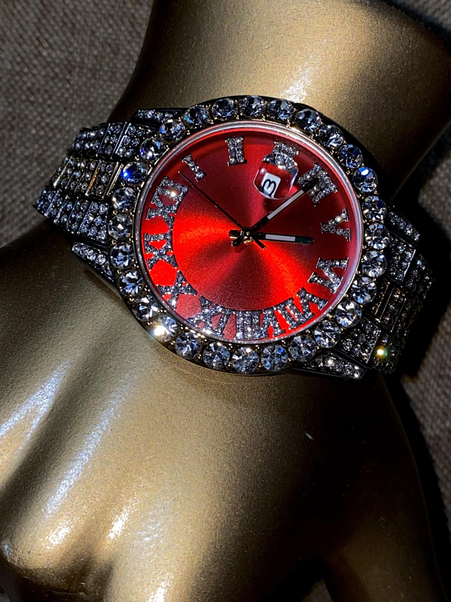 Two-tone iced-out watch with red dial, Roman numerals, and diamond bracelet – luxury streetwear timepiece