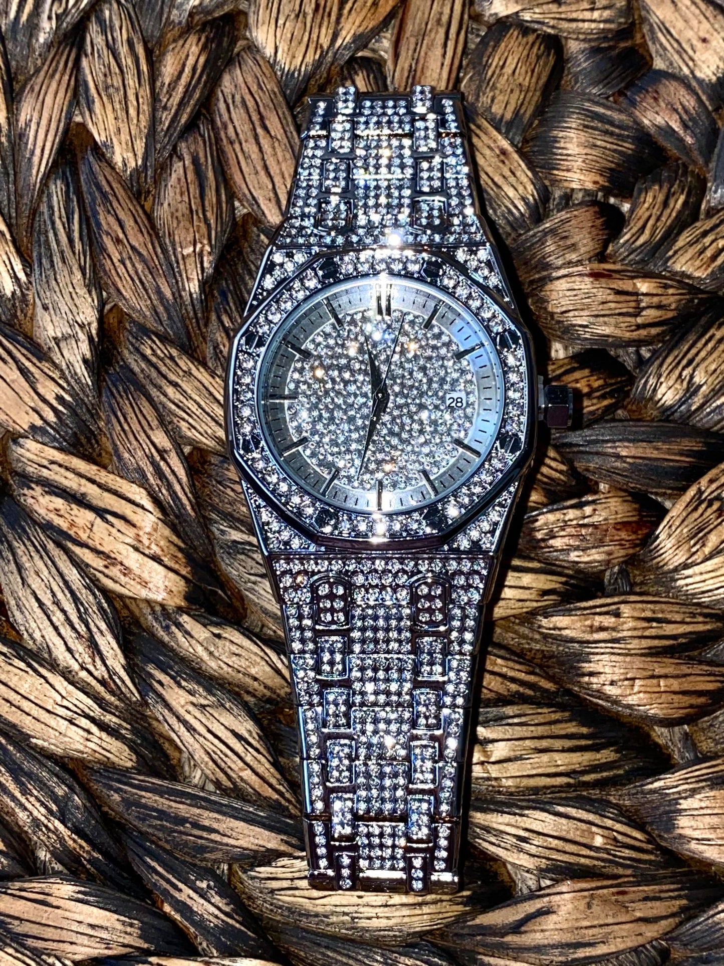 Silver iced-out octagon watch with pavé dial, classic markers, and diamond bracelet – luxury streetwear timepiece