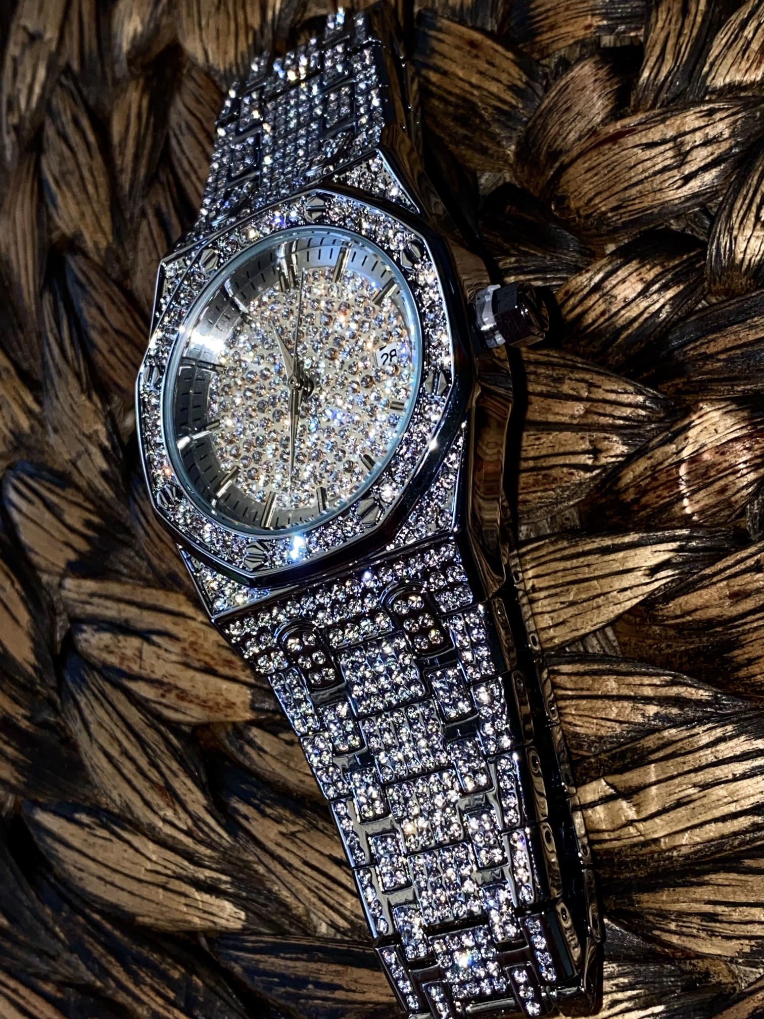 Silver iced-out octagon watch with pavé dial, classic markers, and diamond bracelet – luxury streetwear timepiece