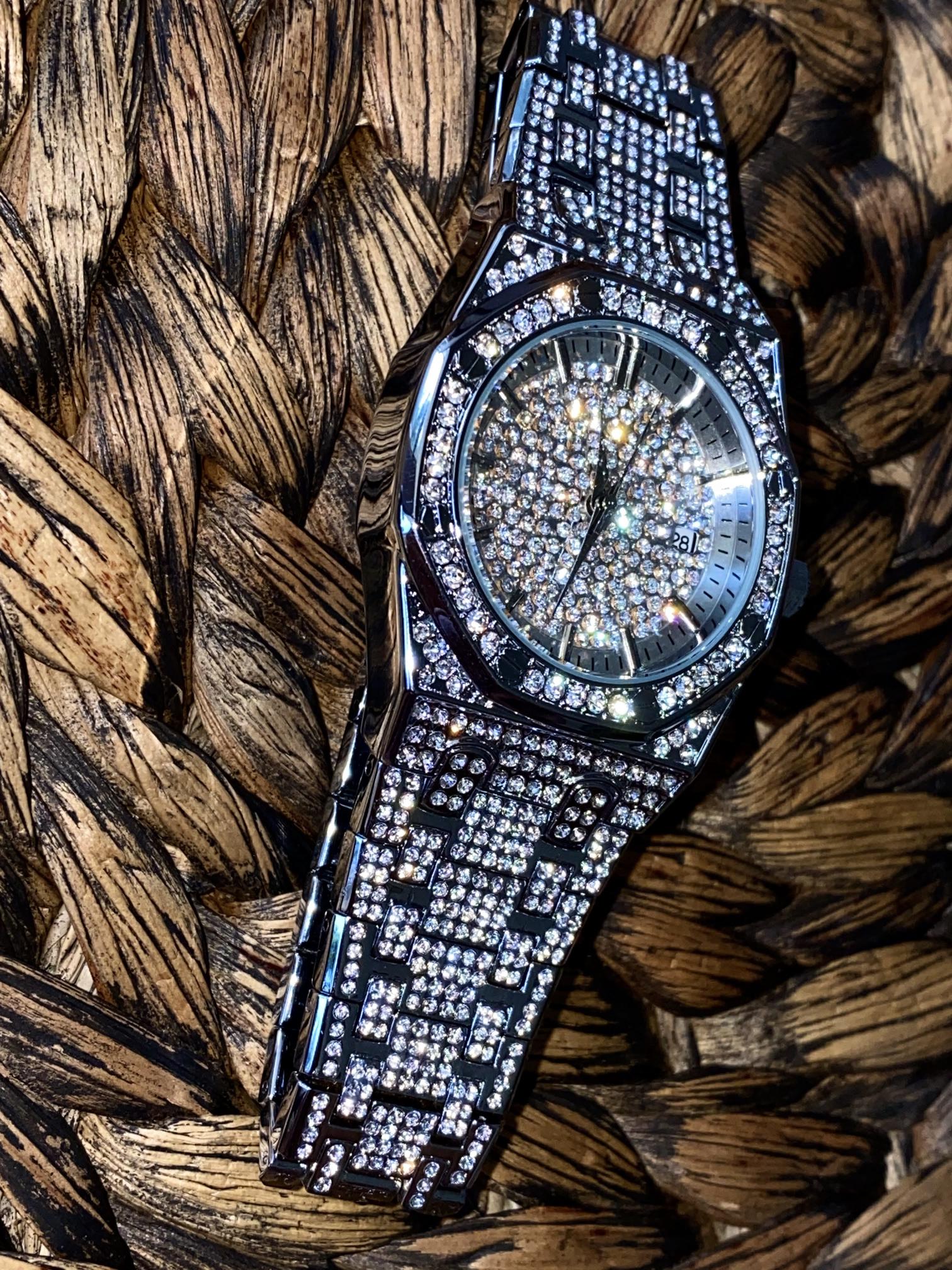 Silver iced-out octagon watch with pavé dial, classic markers, and diamond bracelet – luxury streetwear timepiece