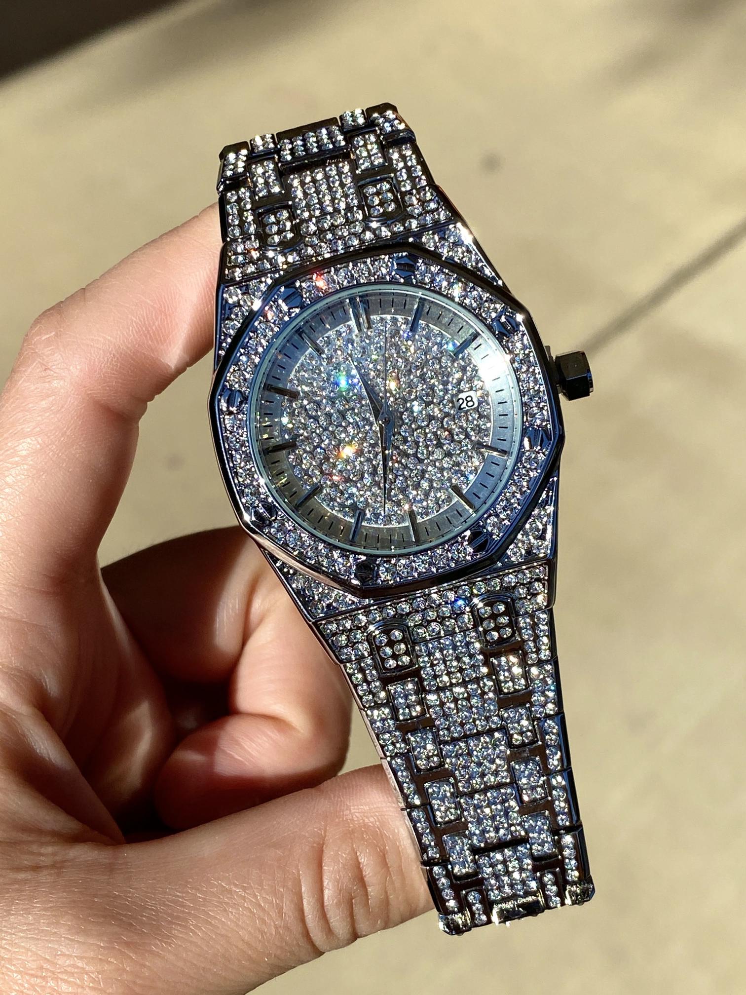 Silver iced-out octagon watch with pavé dial, classic markers, and diamond bracelet – luxury streetwear timepiece