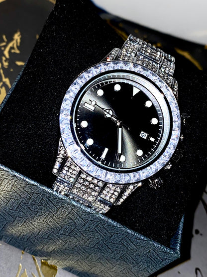 Silver iced chronograph watch with black dial displayed on white ceramic cuff – ShadowFlex 42MM by Time Flex