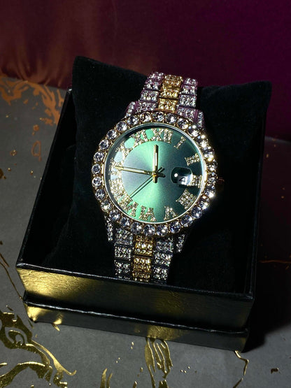 Two-tone iced-out watch with green Roman numeral dial and crystal bezel – luxury statement timepiece