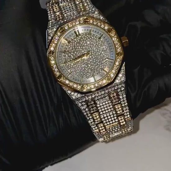 Two-tone silver and gold men's and women's watch with a diamond-studded dial and bezel. The watch features a sparkling design with crystal-encrusted links on the band, offering a luxurious, eye-catching appearance.