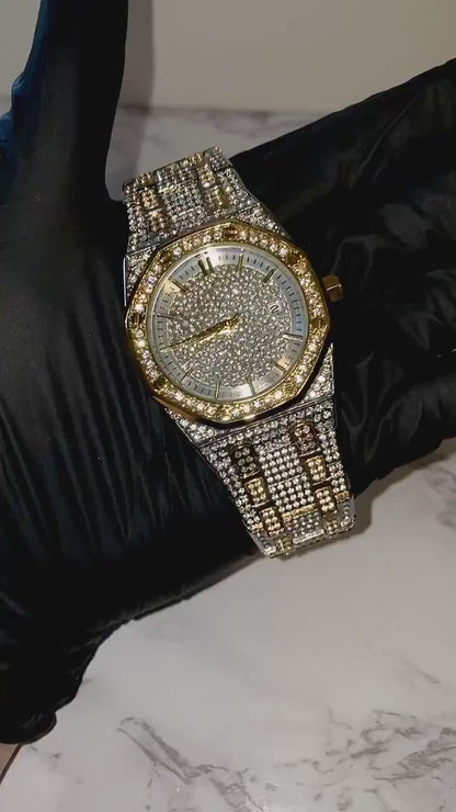 Two-tone silver and gold men's and women's watch with a diamond-studded dial and bezel. The watch features a sparkling design with crystal-encrusted links on the band, offering a luxurious, eye-catching appearance.
