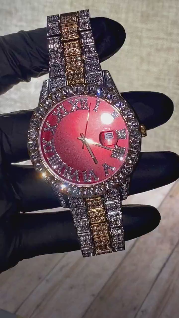 Two-tone iced-out watch with red dial, Roman numerals, and diamond bracelet – luxury streetwear timepiece